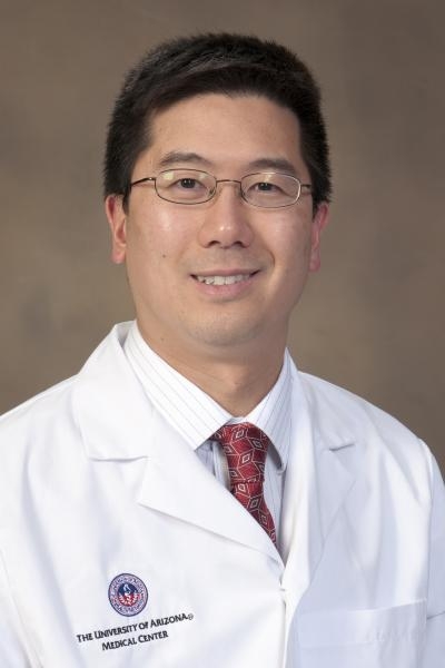 White-coat photo of Dr. Philip Kuo